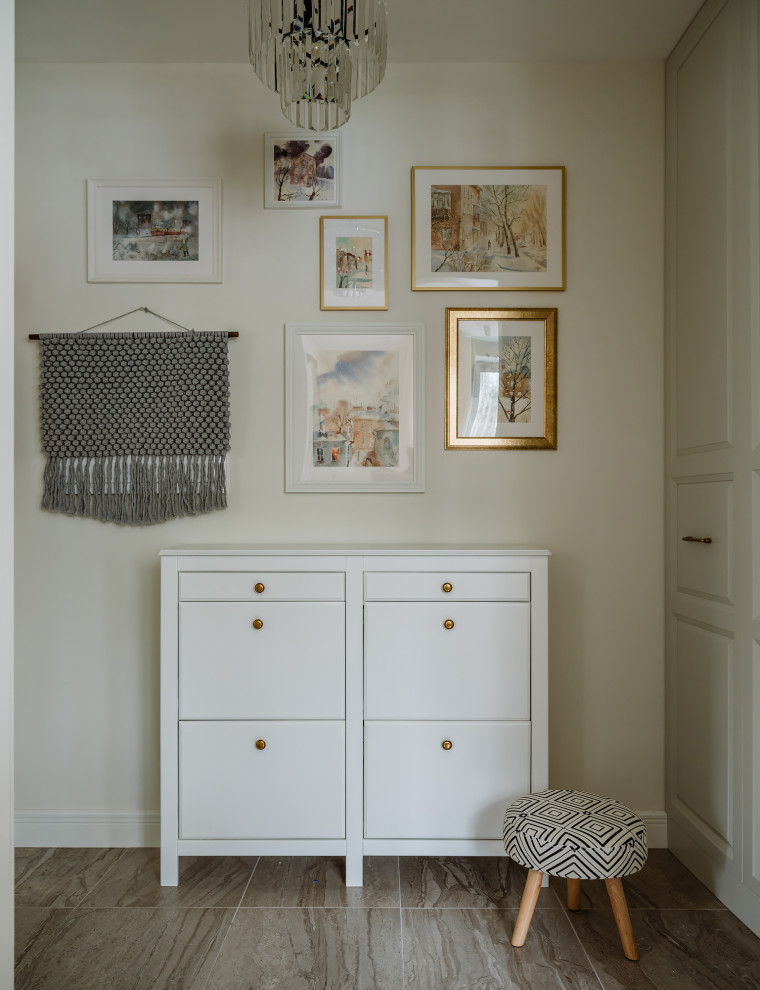Inspiration for a small scandi entrance in Moscow with white walls, ceramic flooring and grey floors.