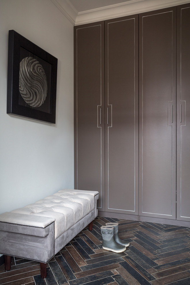 This is an example of a medium sized contemporary entrance in Moscow with white walls.