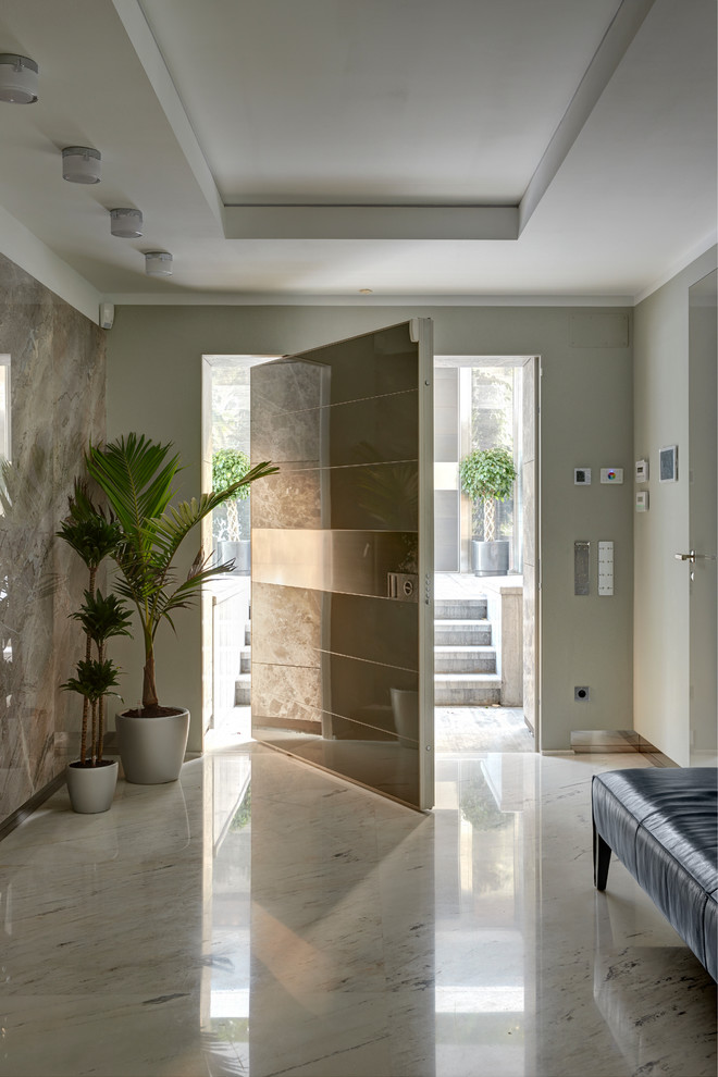 Pivot front door - eclectic beige floor pivot front door idea in Moscow with gray walls