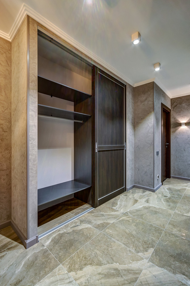 Mid-sized ceramic tile and brown floor entry hall photo in Saint Petersburg with gray walls