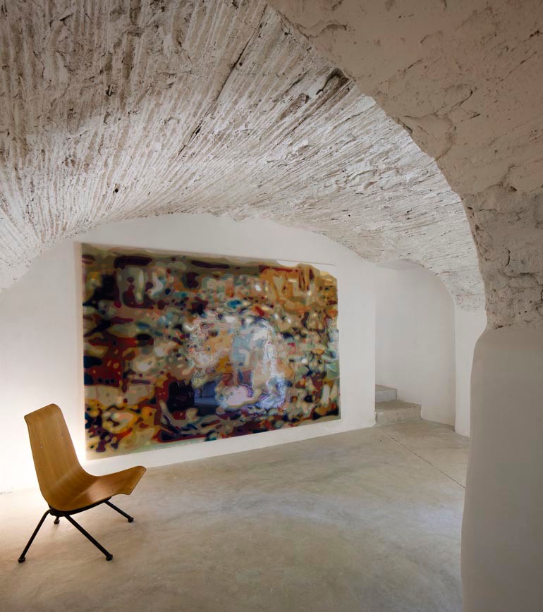 Inspiration for a mid-sized rustic concrete floor hallway remodel in Barcelona with white walls