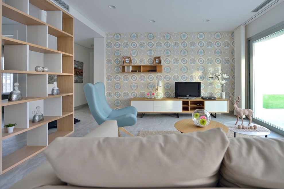 Family room library - mid-sized scandinavian open concept family room library idea in Alicante-Costa Blanca with multicolored walls, no fireplace and a media wall