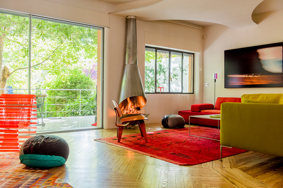 Example of a trendy family room design in Madrid