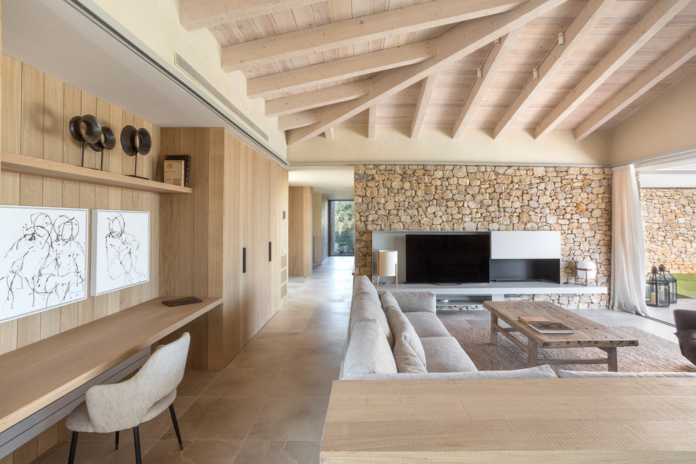 Example of a tuscan family room design in Barcelona