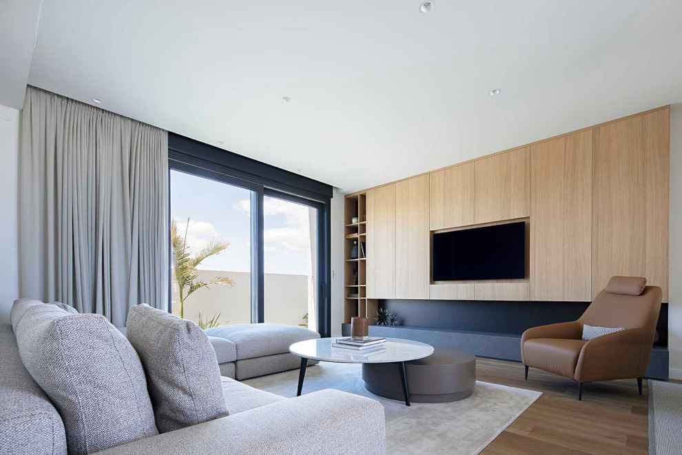 Foto de sala de estar minimalista con alfombra