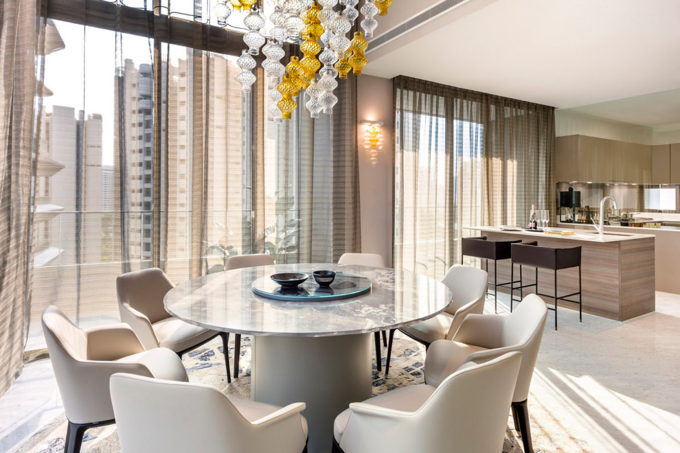 Example of a trendy dining room design in Singapore