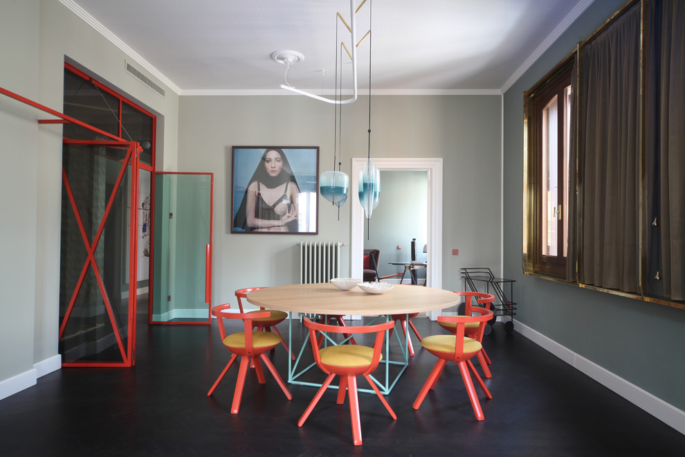 Inspiration for a mid-sized contemporary black floor enclosed dining room remodel with green walls and no fireplace