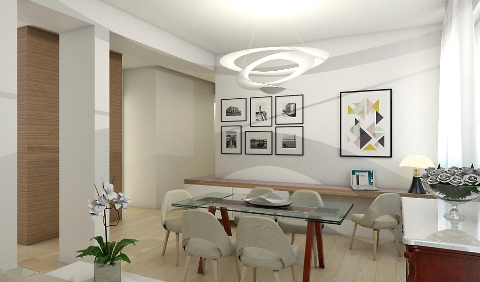 Foto di una sala da pranzo aperta verso il soggiorno minimal di medie dimensioni con parquet chiaro e pareti bianche