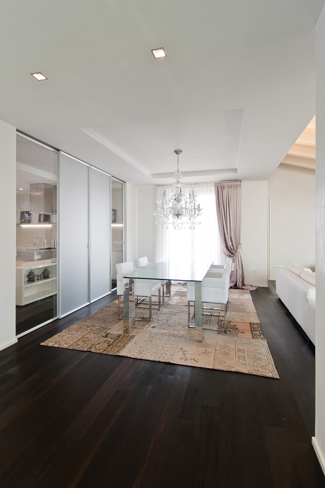 Example of a trendy dining room design in Milan