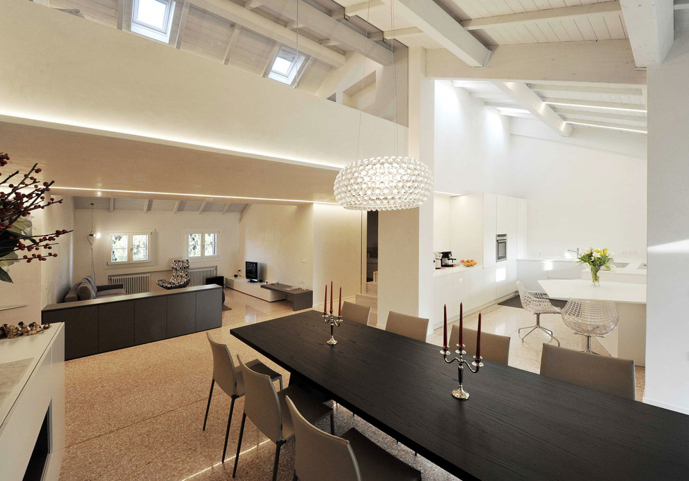Idee per una grande sala da pranzo aperta verso il soggiorno design con pareti bianche
