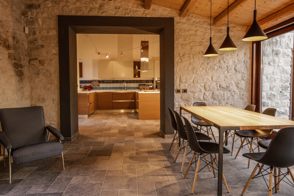 Example of a mountain style dining room design in Catania-Palermo