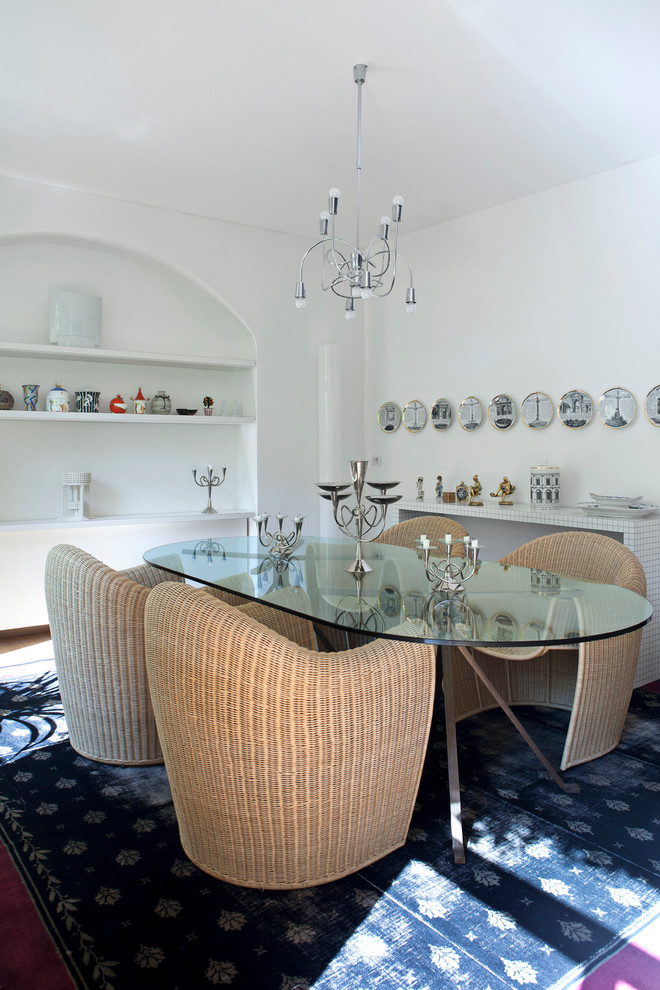 Design ideas for a contemporary dining room in Florence with white walls.