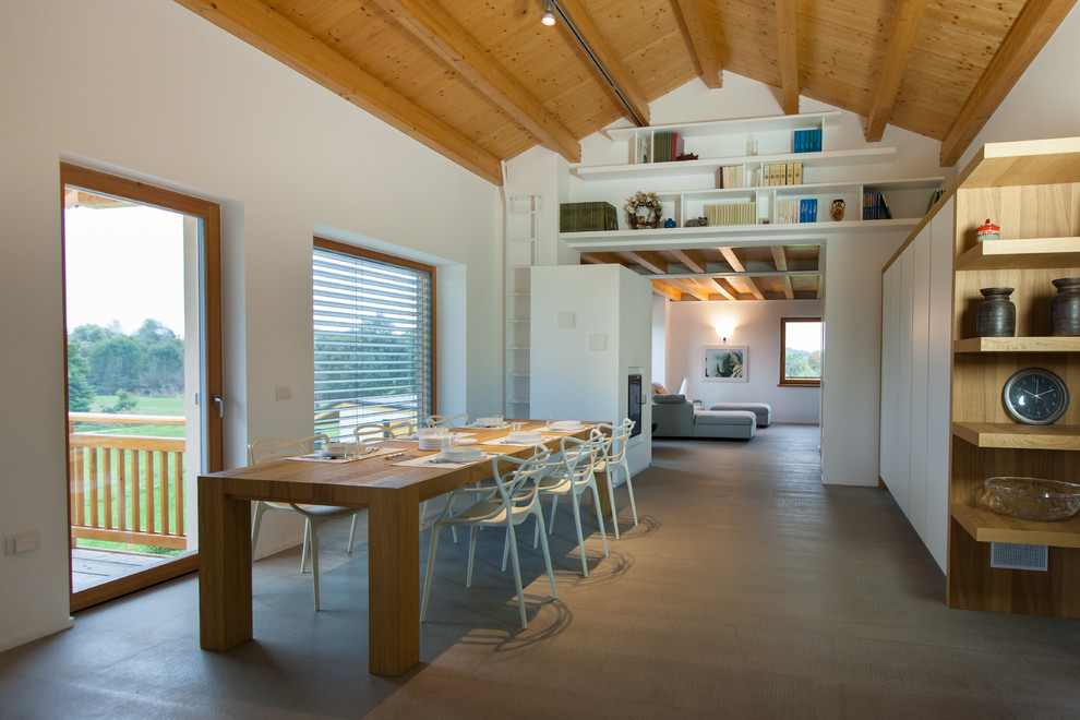 Photo of a large scandi open plan dining room in Venice with white walls.