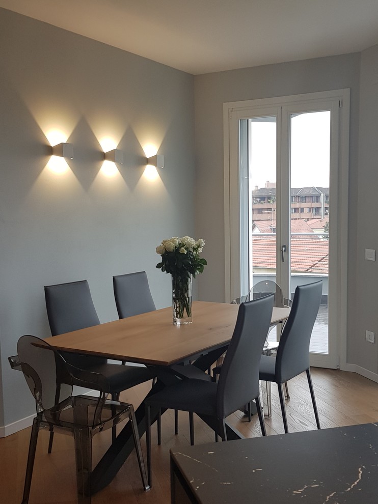 Photo of a contemporary dining room in Milan.