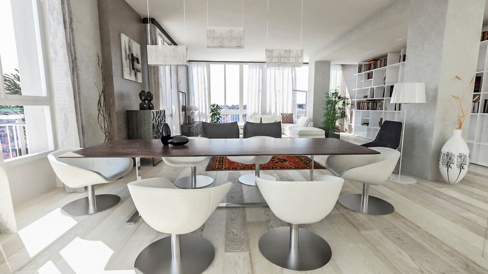 Immagine di una grande sala da pranzo aperta verso il soggiorno design con pareti beige, parquet chiaro e pavimento beige