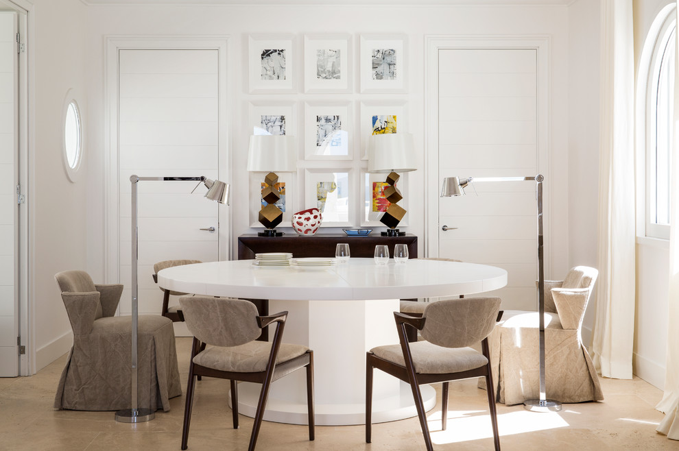 Photo of a contemporary dining room in Rome with white walls.