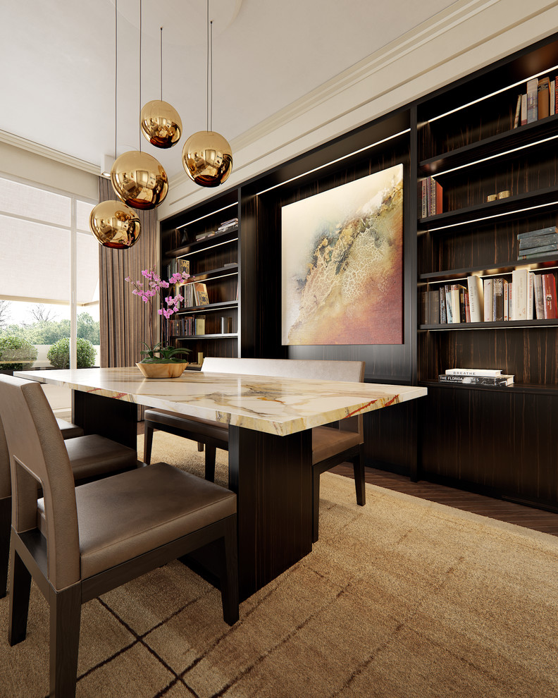 Example of a mid-sized trendy dark wood floor and brown floor enclosed dining room design in Paris with beige walls