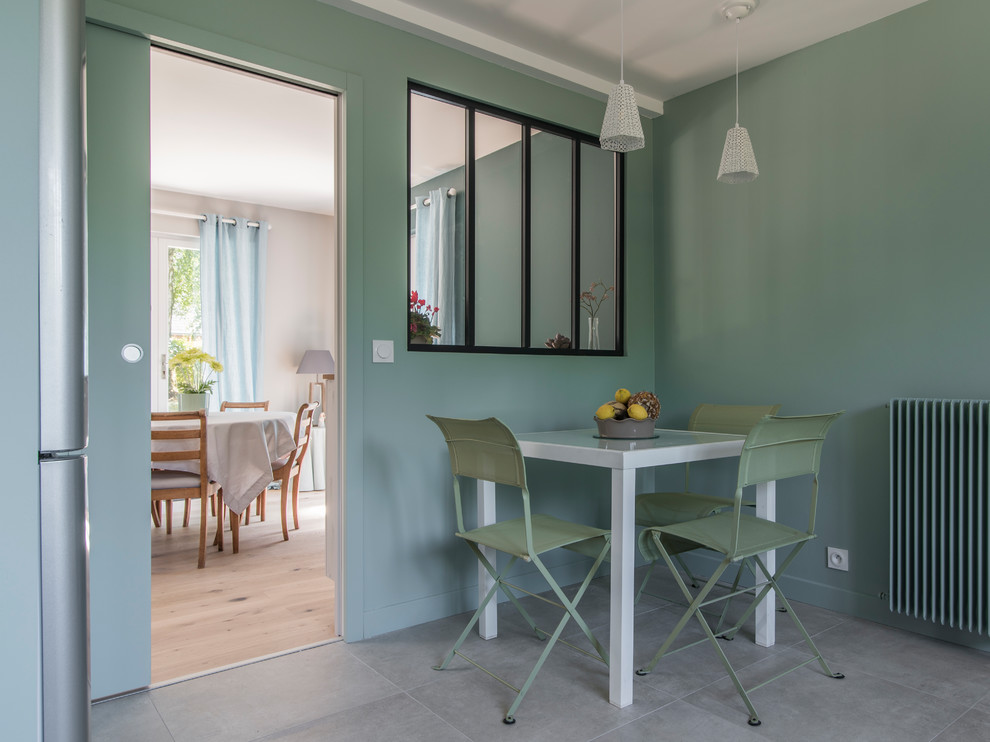 Dining room - contemporary beige floor dining room idea in Lyon