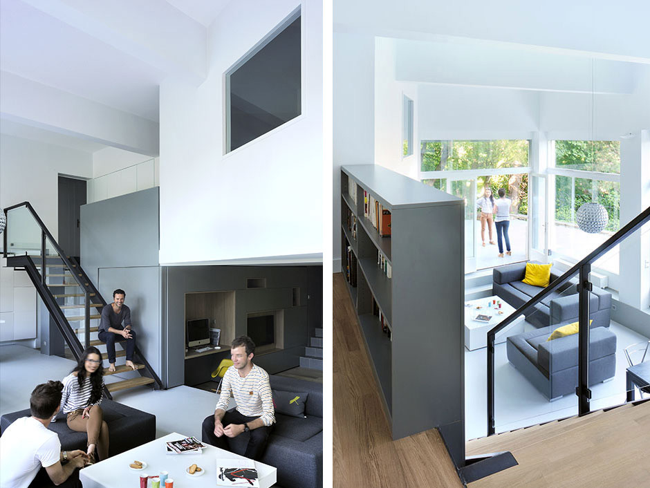 Idee per una grande sala da pranzo aperta verso il soggiorno minimal con pareti bianche, pavimento in cemento e pavimento grigio