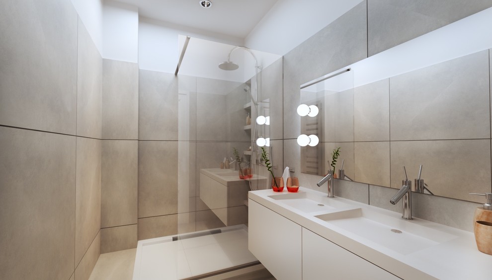 Foto di una stanza da bagno contemporanea di medie dimensioni con piastrelle grigie, piastrelle in ceramica, top in cemento, top grigio e mobile bagno incassato