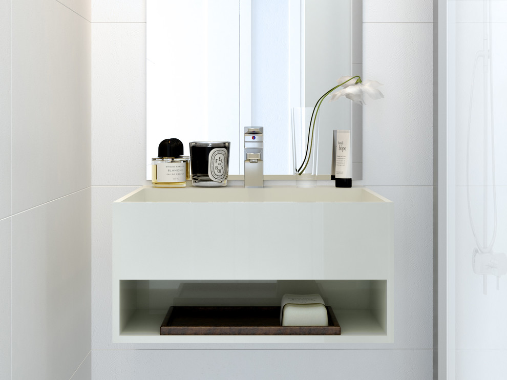 Exemple d'une petite salle de bain tendance avec des portes de placard blanches, un plan de toilette blanc, meuble simple vasque et meuble-lavabo suspendu.