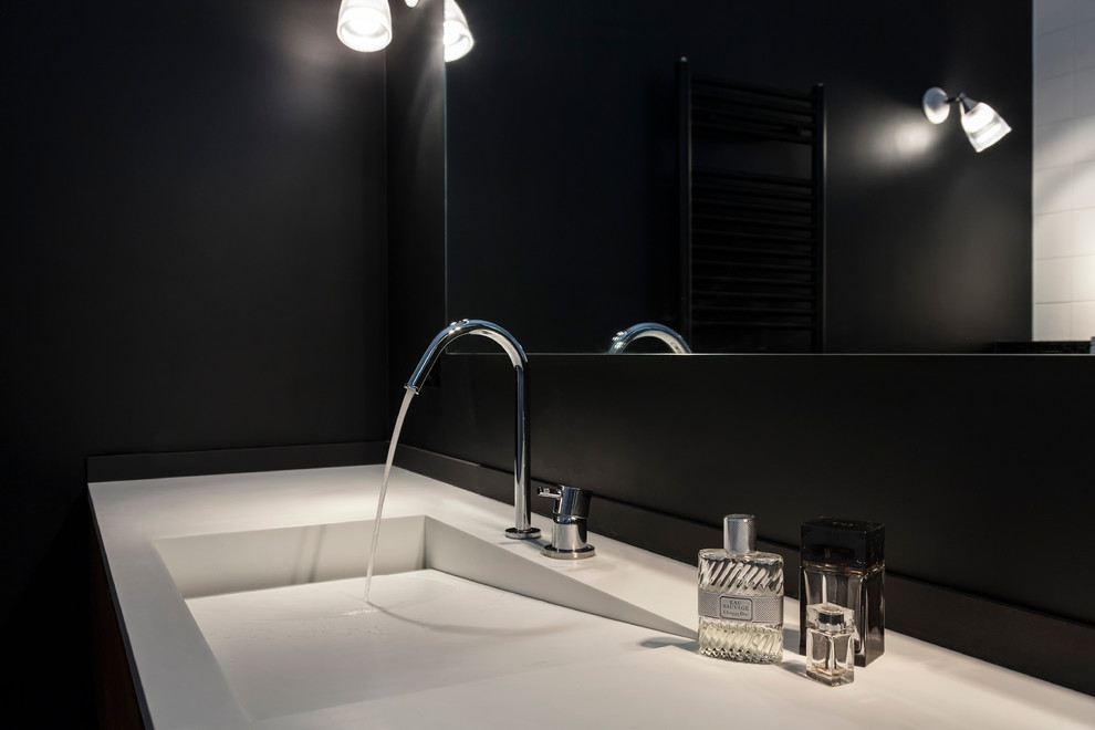 Mid-sized trendy master black tile porcelain tile and white floor bathroom photo in Paris with beaded inset cabinets, brown cabinets, black walls, a console sink and white countertops