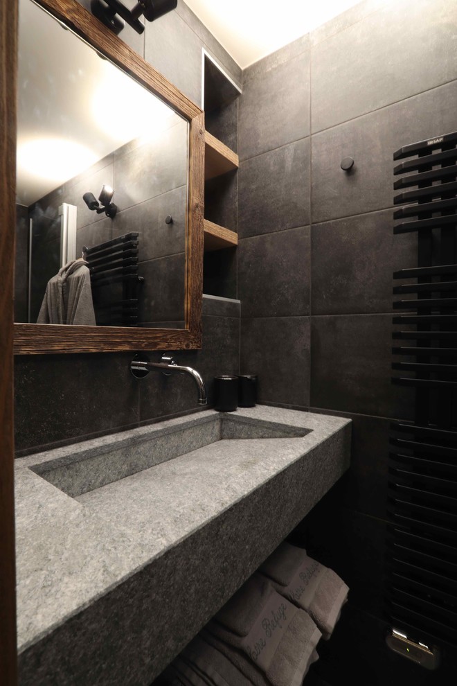 Inspiration for a rustic gray tile walk-in shower remodel in Lyon with a wall-mount sink