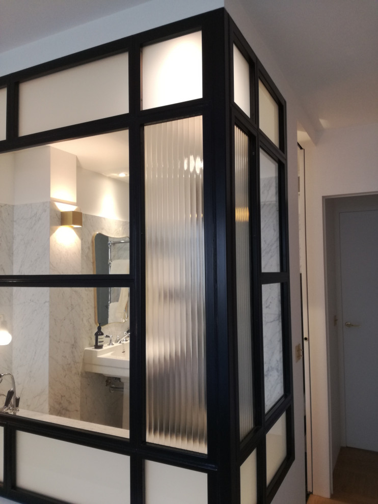 Medium sized industrial shower room bathroom in Paris with beaded cabinets, a submerged bath, an alcove shower, white tiles, marble tiles, white walls, mosaic tile flooring, a trough sink, white floors, an open shower, a wall niche, a single sink, a built in vanity unit and a drop ceiling.