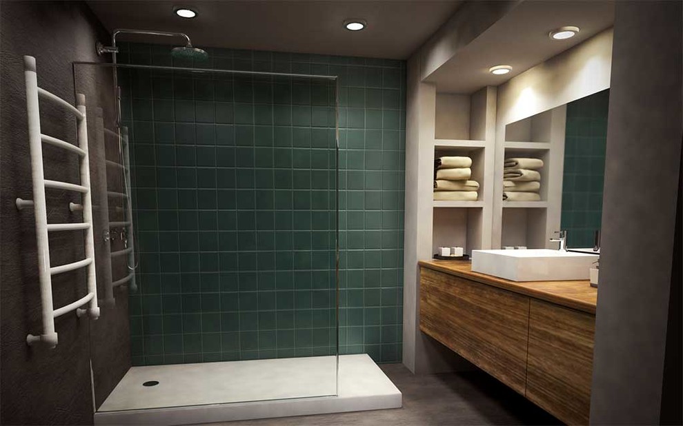 Modern inredning av ett mellanstort brun brunt badrum med dusch, med en kantlös dusch, en vägghängd toalettstol, grå kakel, keramikplattor, grå väggar, klinkergolv i keramik, ett nedsänkt handfat, träbänkskiva, grått golv och med dusch som är öppen