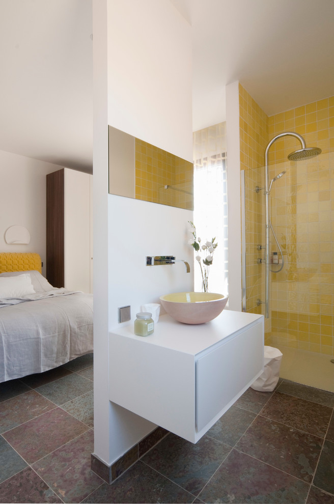 Example of a mid-sized trendy 3/4 yellow tile walk-in shower design in Nice with white walls and a vessel sink