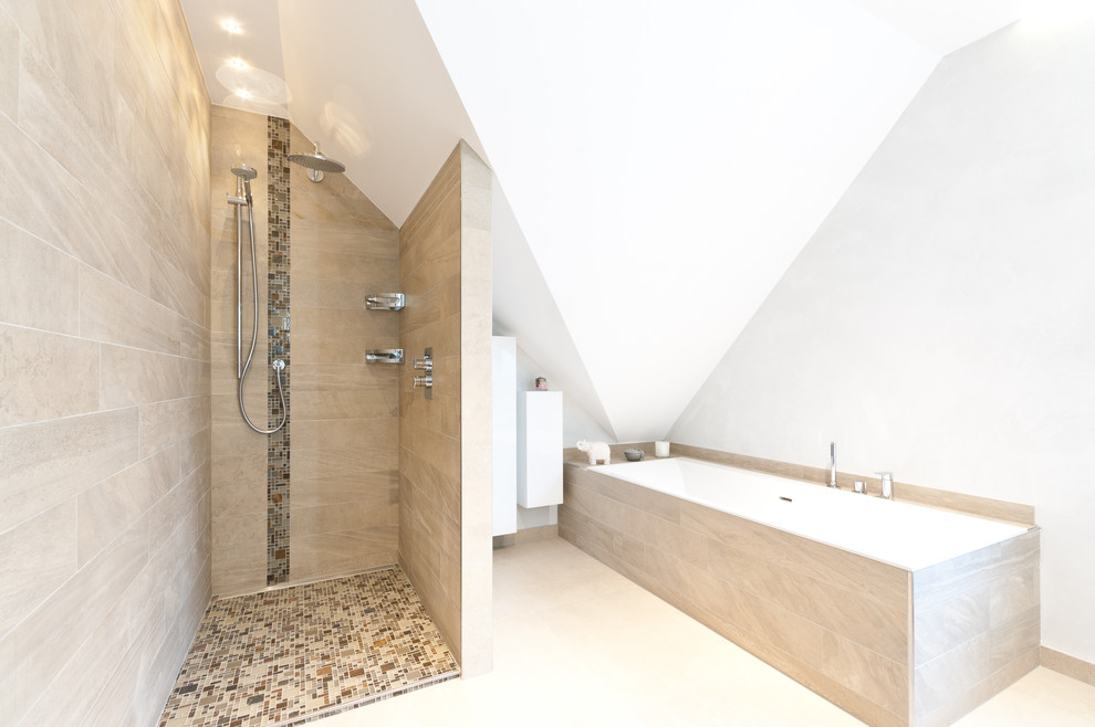 Photo of a large modern ensuite bathroom in Strasbourg with a submerged bath, beige tiles, beige floors, a built-in shower, a wall mounted toilet, grey walls, a console sink, solid surface worktops, flat-panel cabinets, white cabinets, ceramic flooring and white worktops.