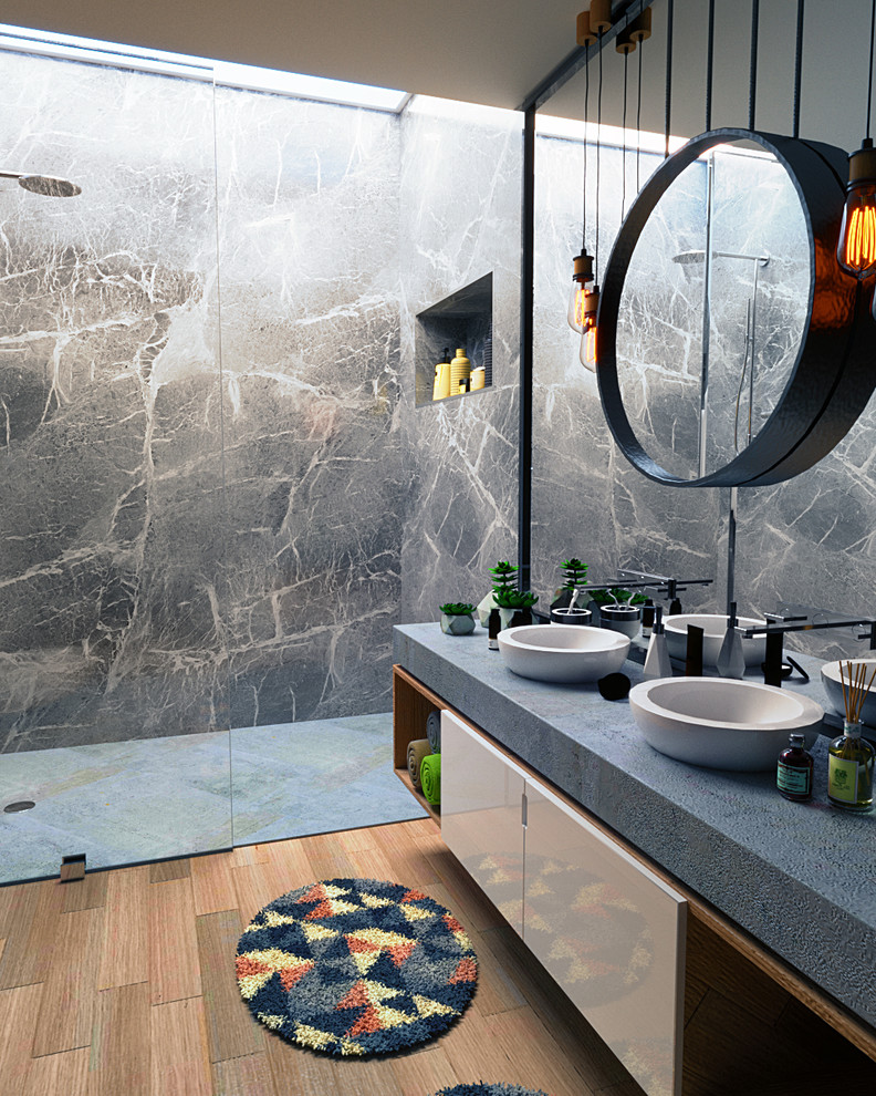 Réalisation d'une salle d'eau design de taille moyenne avec une douche à l'italienne, un mur gris, parquet clair et un plan vasque.