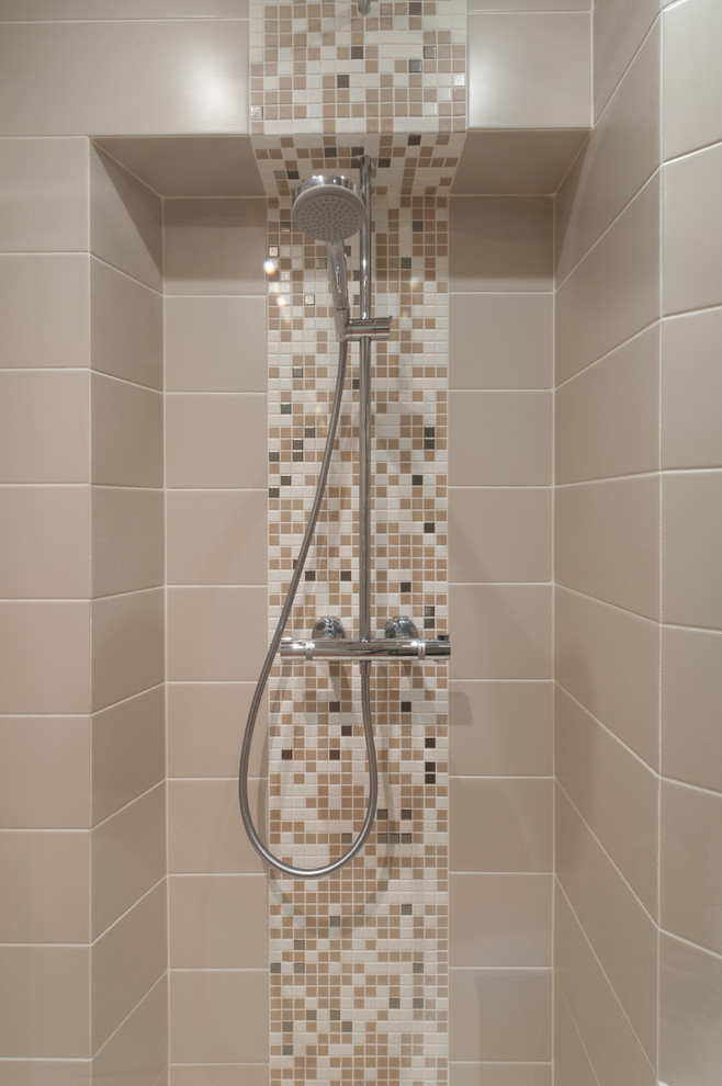 Mid-sized trendy 3/4 beige tile and mosaic tile walk-in shower photo in Paris with a vessel sink, beige cabinets, wood countertops, a one-piece toilet and beige walls