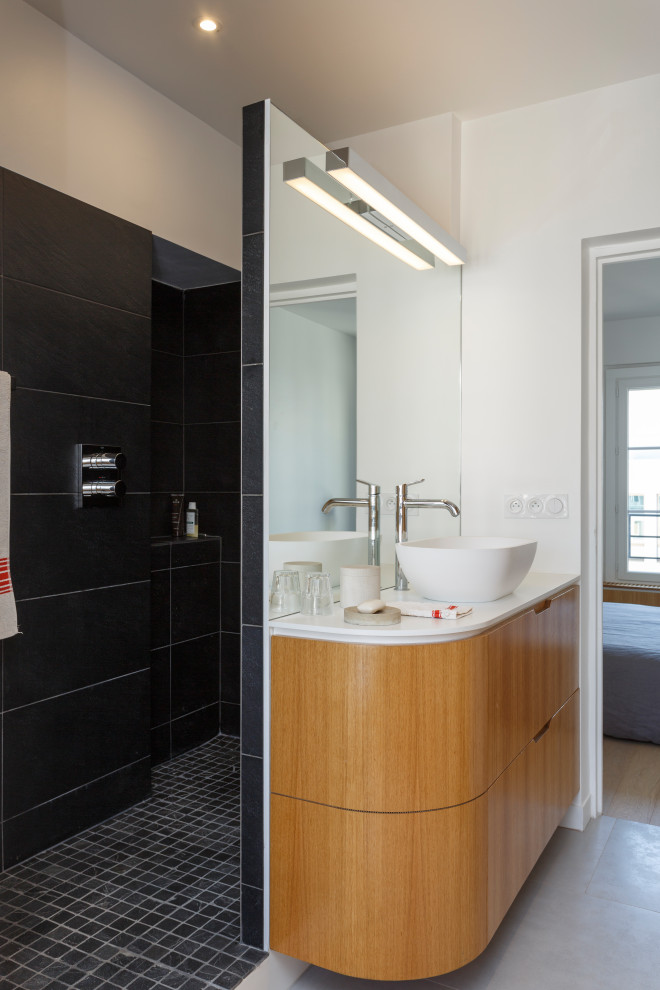 Medium sized contemporary shower room bathroom in Paris with flat-panel cabinets, medium wood cabinets, an alcove shower, white walls, porcelain flooring, a vessel sink, grey floors, an open shower, white worktops, a wall niche, a single sink and a floating vanity unit.