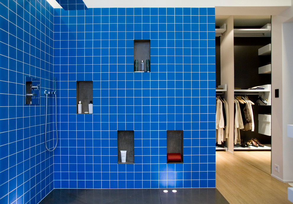 Photo of a medium sized contemporary shower room bathroom in Paris with blue tiles, blue walls and a built-in shower.