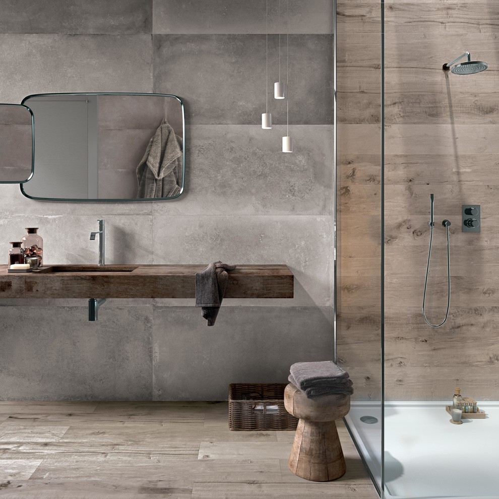 Bathroom - contemporary master gray tile and cement tile medium tone wood floor bathroom idea in Toulouse with gray walls, an undermount sink, wood countertops and brown countertops