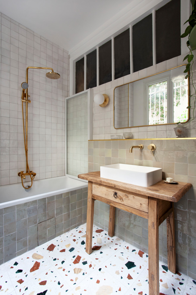 Medium sized traditional shower room bathroom in Paris with medium wood cabinets, a built-in bath, a shower/bath combination, brown walls, wooden worktops, brown worktops, a single sink and a freestanding vanity unit.
