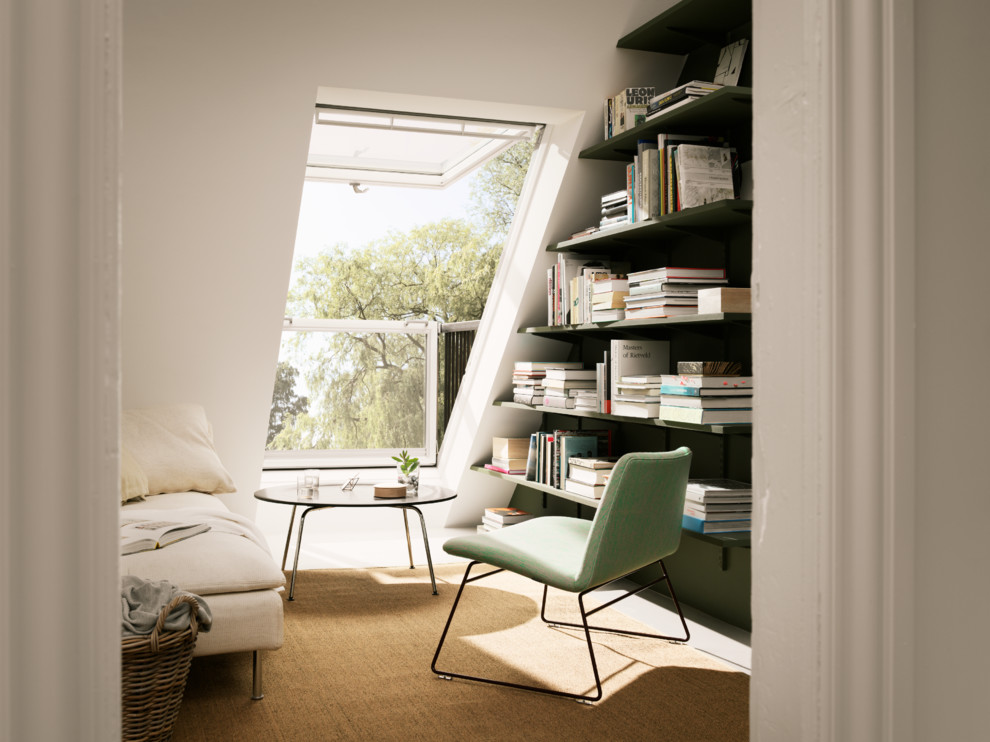 Foto di un piccolo soggiorno minimal con libreria, pareti bianche, nessun camino, moquette e nessuna TV