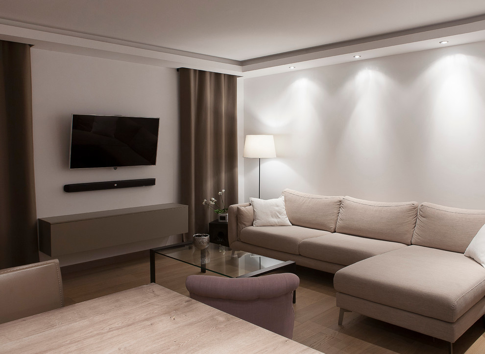 Example of a minimalist family room design in Strasbourg