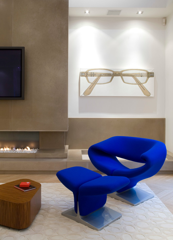 Inspiration for a contemporary games room in Paris with white walls, light hardwood flooring, a ribbon fireplace and a wall mounted tv.