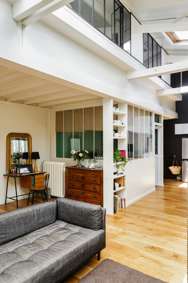 Inspiration for an industrial family room remodel in Paris