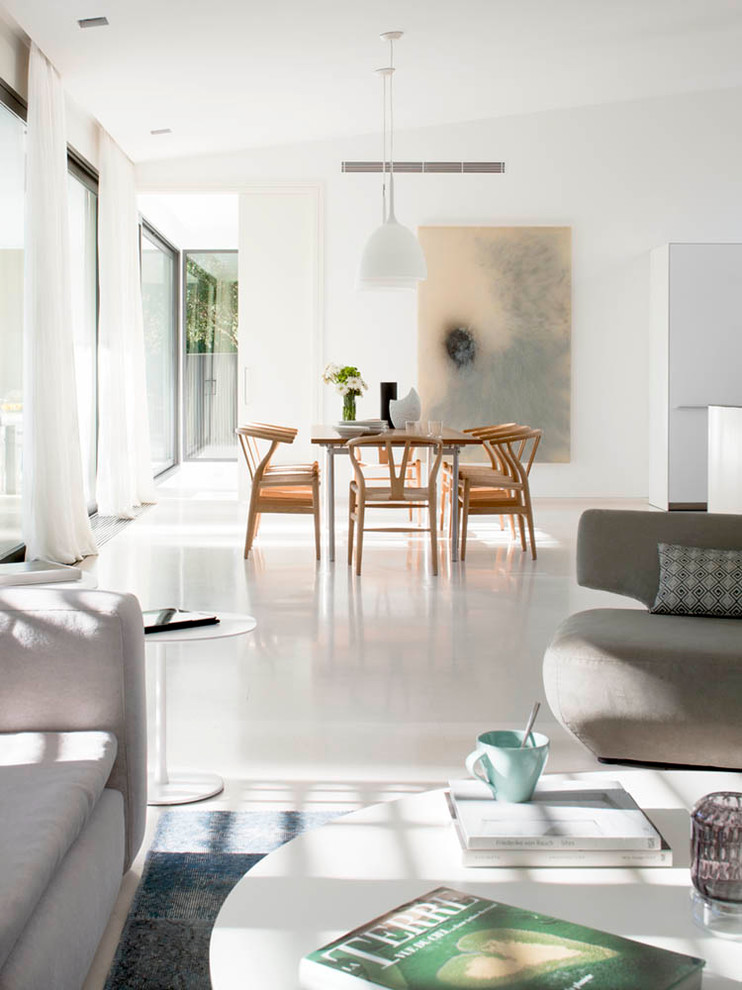Design ideas for a medium sized contemporary formal open plan living room in Palma de Mallorca with white walls.