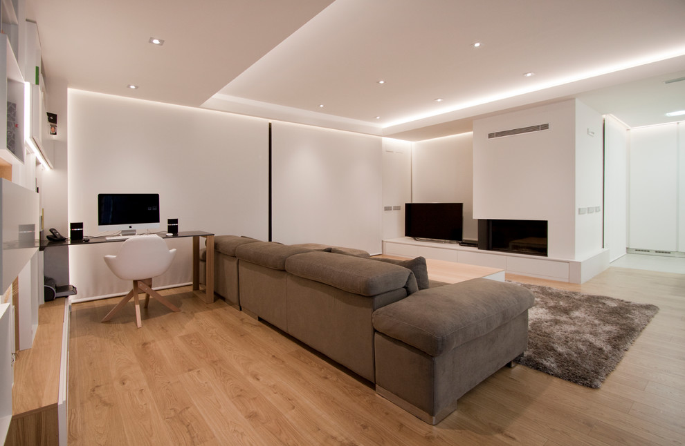 This is an example of a large contemporary open plan living room in Other with white walls, medium hardwood flooring and a built-in media unit.