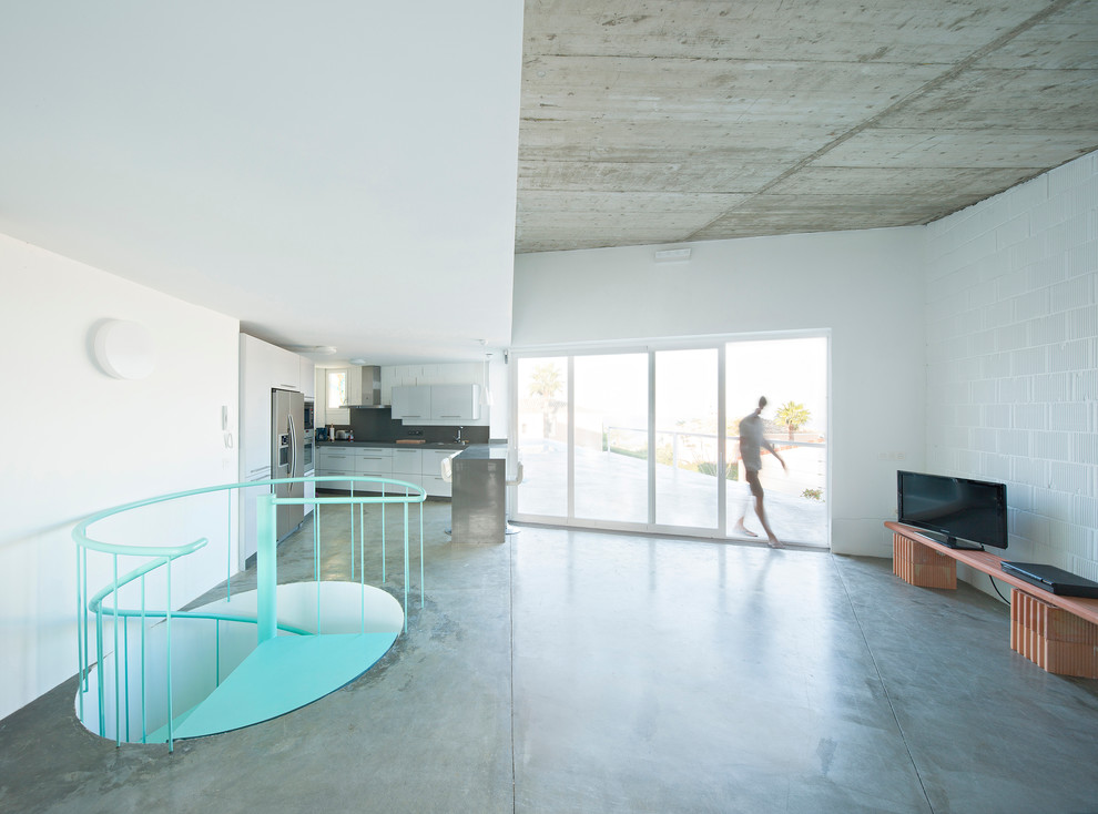 Living room - industrial living room idea in Malaga