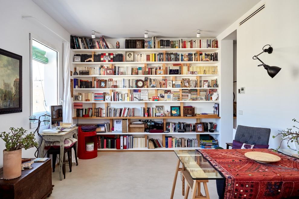 Свежая идея для дизайна: изолированная гостиная комната среднего размера в современном стиле с с книжными шкафами и полками, белыми стенами и бежевым полом без камина, телевизора - отличное фото интерьера