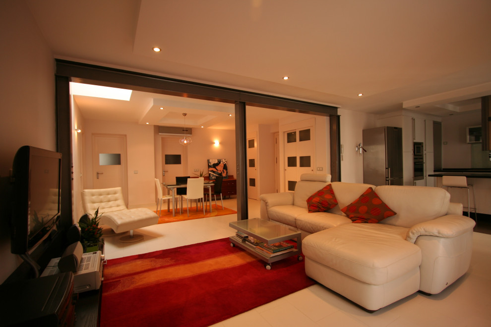 This is an example of a medium sized modern open plan living room in Other with white floors.