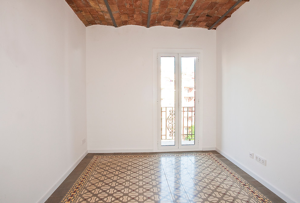 This is an example of a medium sized classic open plan living room in Barcelona with white walls, ceramic flooring and no fireplace.