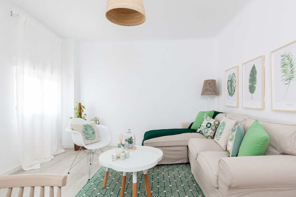 Living room - mid-sized scandinavian formal and open concept light wood floor and beige floor living room idea in Madrid with white walls, no fireplace and no tv