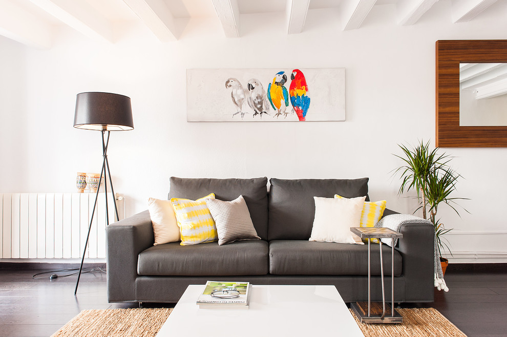 Immagine di un soggiorno design di medie dimensioni e aperto con pareti bianche e parquet scuro