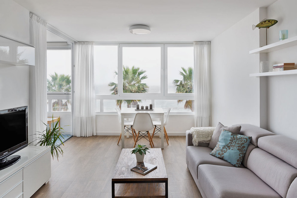 Design ideas for a medium sized scandinavian open plan living room in Alicante-Costa Blanca with white walls, porcelain flooring, a built-in media unit and brown floors.